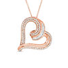 Thumbnail Image 0 of 0.50 CT. T.W. Baguette and Round Diamond Tilted Heart Pendant in 10K Rose Gold