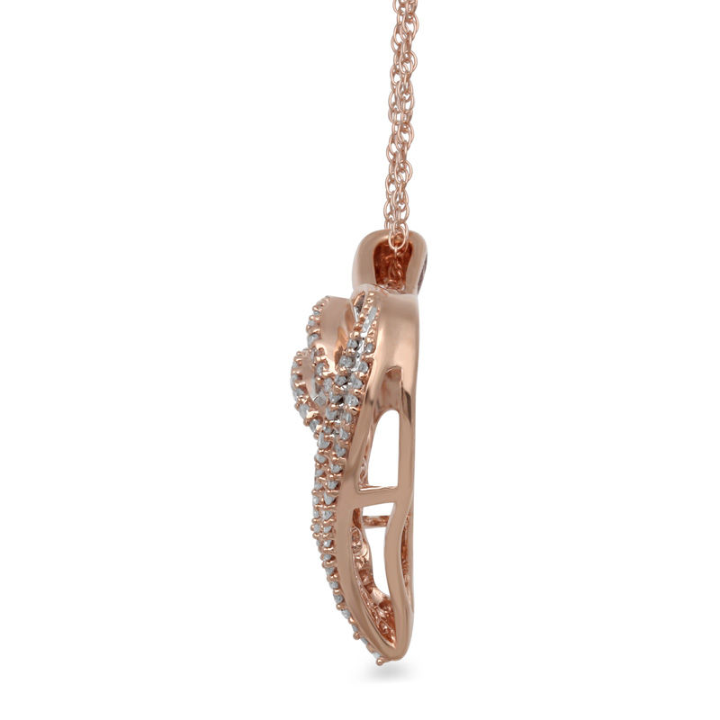 0.25 CT. T.W. Baguette and Round Diamond Heart Pendant in 10K Rose Gold