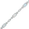 Thumbnail Image 1 of Oval Lab-Created Opal Rope Bracelet in Sterling Silver - 7.5"