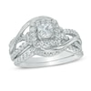 0.95 CT. T.W. Princess-Cut Diamond Frame Swirl Bridal Set in 10K White Gold