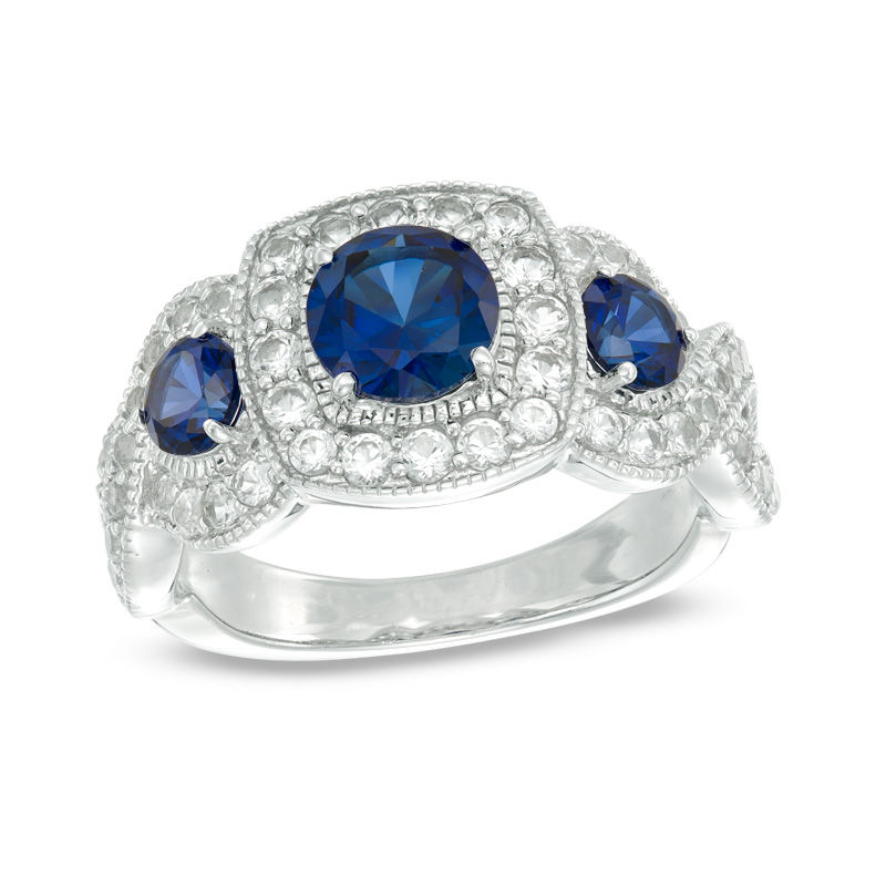 Lab-Created Blue and White Sapphire Frame Three Stone Ring in Sterling Silver