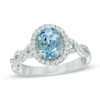 Thumbnail Image 0 of Oval Aquamarine and 0.30 CT. T.W. Diamond Frame Twist Engagement Ring in 14K White Gold