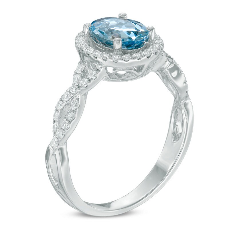 Oval Aquamarine and 0.30 CT. T.W. Diamond Frame Twist Engagement Ring in 14K White Gold