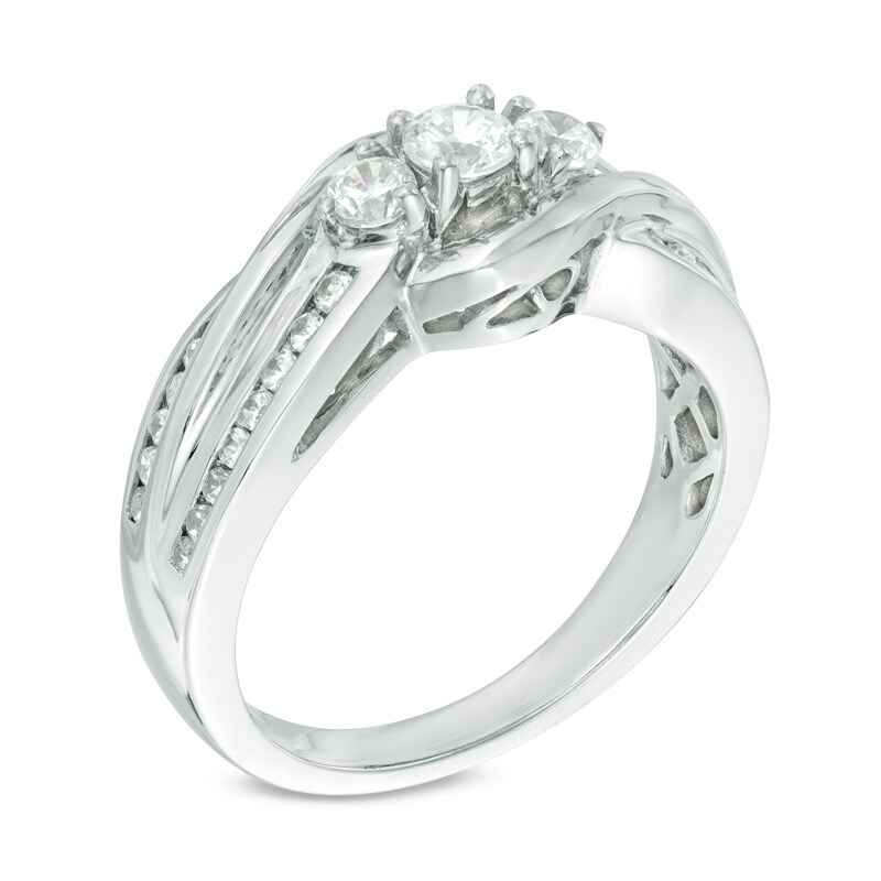 0.45 CT. T.W. Diamond Three Stone Bypass Ring in 10K White Gold