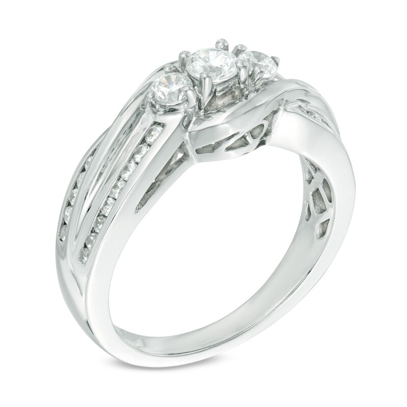 0.45 CT. T.W. Diamond Three Stone Bypass Ring in 10K White Gold