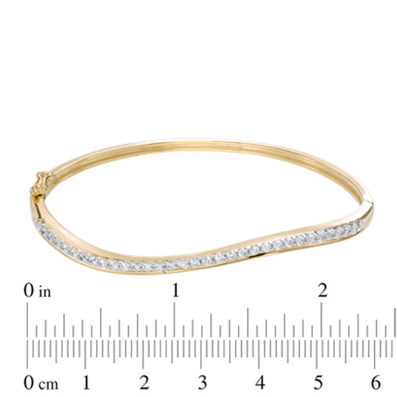 Main Image 2 of 0.95 CT. T.W. Diamond Wavy Bangle in Sterling Silver and 14K Gold Plate