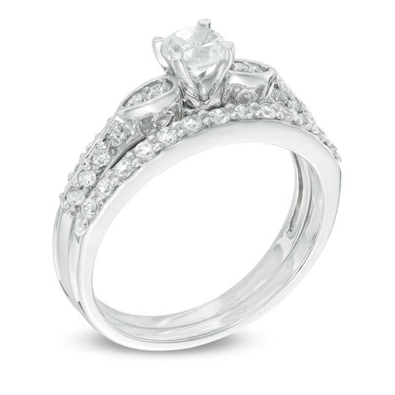 Main Image 2 of 4.0mm Lab-Created White Sapphire and 0.18 CT. T.W. Diamond Bridal Set in 10K White Gold