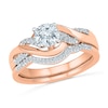 Thumbnail Image 0 of White Lab-Created Sapphire and Diamond Accent Twist Bridal Set in 10K Rose Gold