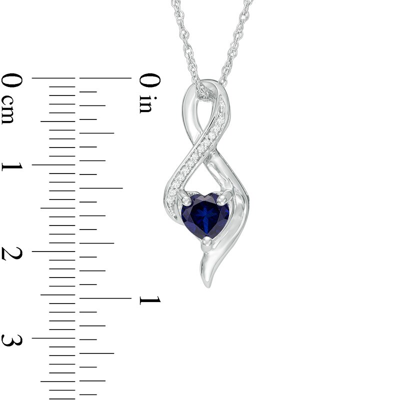 6.5mm Heart-Shaped Lab-Created Blue Sapphire and Diamond Accent Infinity Pendant in 10K White Gold