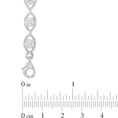 Lab-Created White Sapphire and 0.09 CT. T.W. Diamond Oval Link Bracelet in Sterling Silver - 7.5"