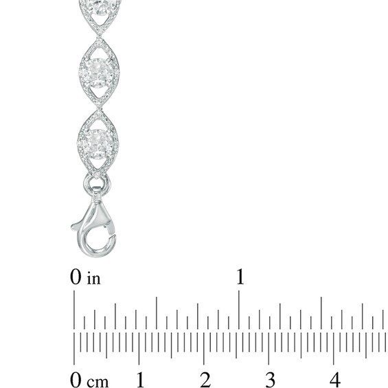 Lab-Created White Sapphire and 0.09 CT. T.W. Diamond Oval Link Bracelet in Sterling Silver - 7.5"