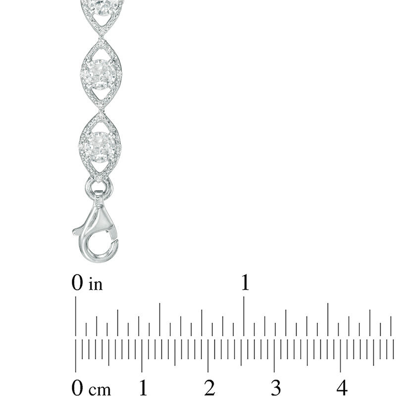 Lab-Created White Sapphire and 0.09 CT. T.W. Diamond Oval Link Bracelet in Sterling Silver - 7.5"