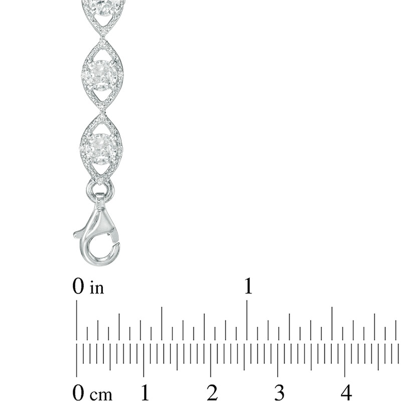 Lab-Created White Sapphire and 0.09 CT. T.W. Diamond Oval Link Bracelet in Sterling Silver - 7.5"