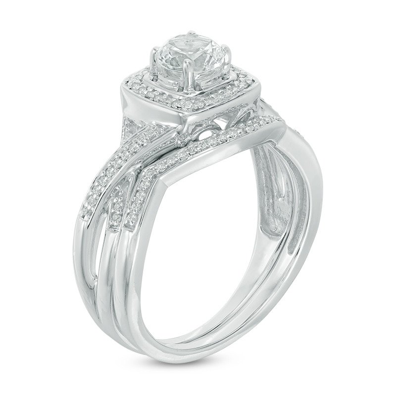 5.0mm Lab-Created White Sapphire and 0.11 CT. T.W. Diamond Frame Twist Bridal Set in Sterling Silver