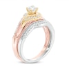 0.45 CT. T.W. Diamond Swirl Bridal Set in 10K Tri-Tone Gold