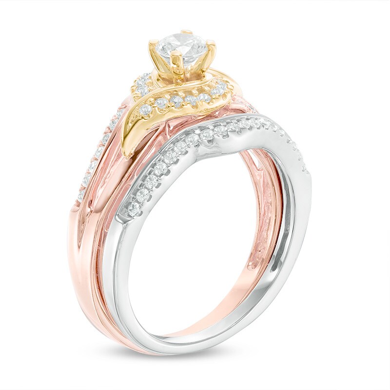 0.45 CT. T.W. Diamond Swirl Bridal Set in 10K Tri-Tone Gold