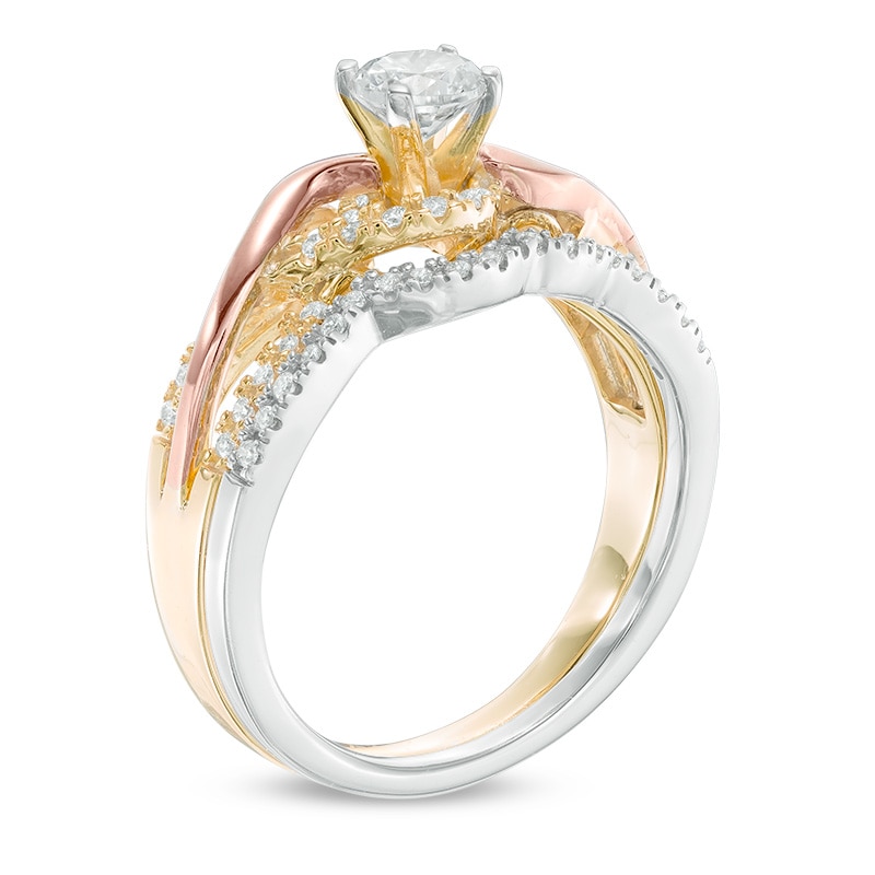 Main Image 2 of 0.45 CT. T.W. Diamond Twist Bridal Set in 10K Tri-Tone Gold