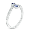 Thumbnail Image 1 of Vera Wang Love Collection 0.13 CT. T.W. Diamond and Blue Sapphire Bypass Ring in 14K White Gold