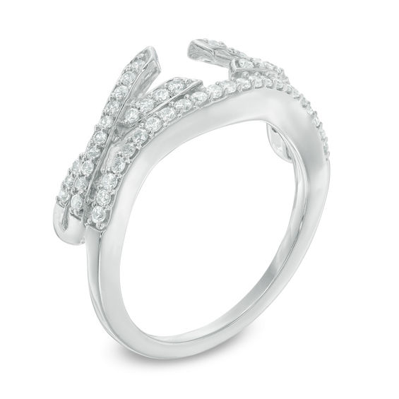 0.29 CT. T.W. Diamond Twist Solitaire Enhancer in 10K White Gold