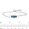 Thumbnail Image 1 of 6.0mm London Blue Topaz and Lab-Created White Sapphire Three Stone Bypass Bolo Bracelet in Sterling Silver - 8.0"