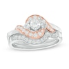 Thumbnail Image 0 of 0.70 CT. T.W. Diamond Twist Frame Bridal Set in 10K Two-Tone Gold