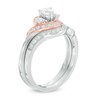 Thumbnail Image 1 of 0.70 CT. T.W. Diamond Twist Frame Bridal Set in 10K Two-Tone Gold