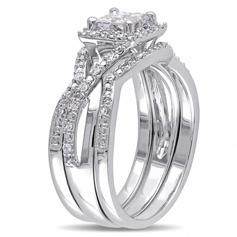 0.50 CT. T.W. Quad Princess-Cut Diamond Twist Shank Three Piece Bridal Set Sterling Silver