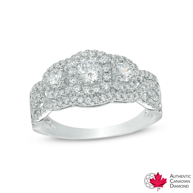 0.95 CT. T.W. Certified Canadian Diamond Three Stone Frame Engagement Ring in 14K White Gold (I/I2)