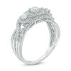 Thumbnail Image 1 of 0.95 CT. T.W. Certified Canadian Diamond Three Stone Frame Engagement Ring in 14K White Gold (I/I2)
