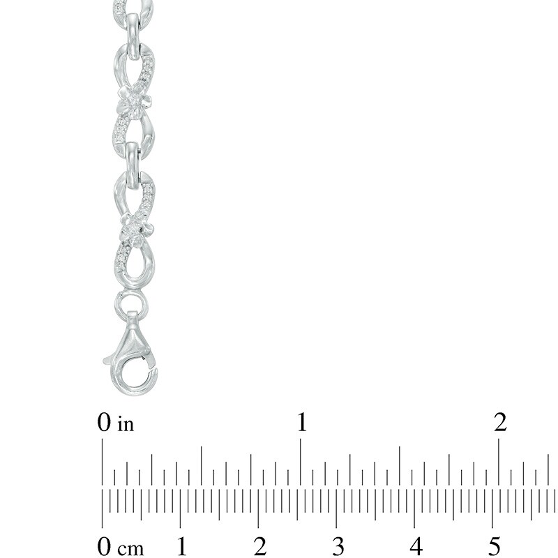 0.30 CT. T.W. Diamond Infinity Link Flower Bracelet in Sterling Silver - 7.5"