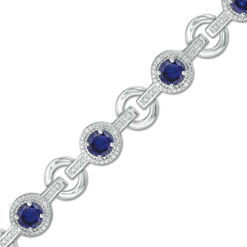 5.0mm Lab-Created Blue Sapphire and 0.09 CT. T.W. Diamond Circle Link Bracelet in Sterling Silver - 7.25"|Peoples Jewellers