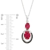 Thumbnail Image 1 of Oval Lab-Created Ruby and 0.09 CT. T.W. Enhanced Black and White Diamond Double Drop Pendant in 10K White Gold