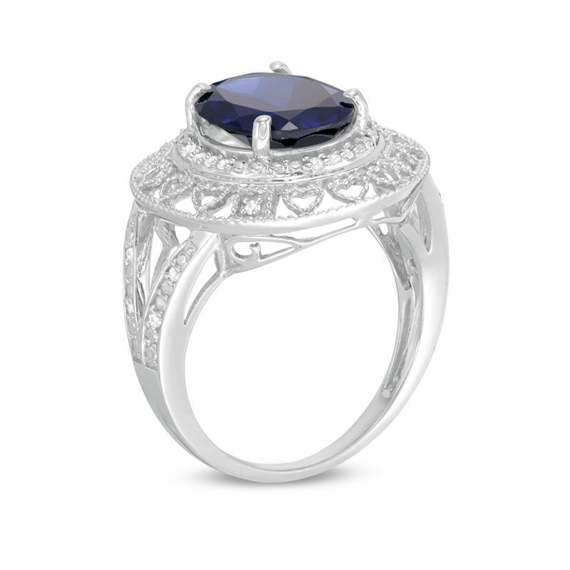 Oval Lab-Created Blue Sapphire and 0.14 CT. T.W. Diamond Hearts Frame Ring in Sterling Silver