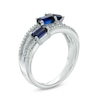Thumbnail Image 1 of Emerald-Cut Lab-Created Blue Sapphire and 0.11 CT. T.W. Diamond Three Stone Slant Ring in Sterling Silver