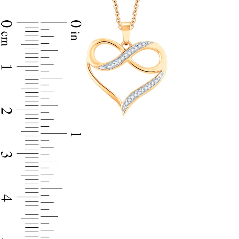 0.05 CT. T.W. Diamond Heart with Infinity Pendant in 10K Gold