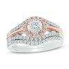 0.83 CT. T.W. Diamond Frame Split Shank Bridal Set in 10K Two-Tone Gold