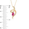 Oval Ruby and Diamond Accent Looping Ribbon Pendant in 10K Gold