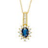 Thumbnail Image 0 of Oval Blue Sapphire and 0.25 CT. T.W. Diamond Starburst Frame Drop Pendant in 10K Gold