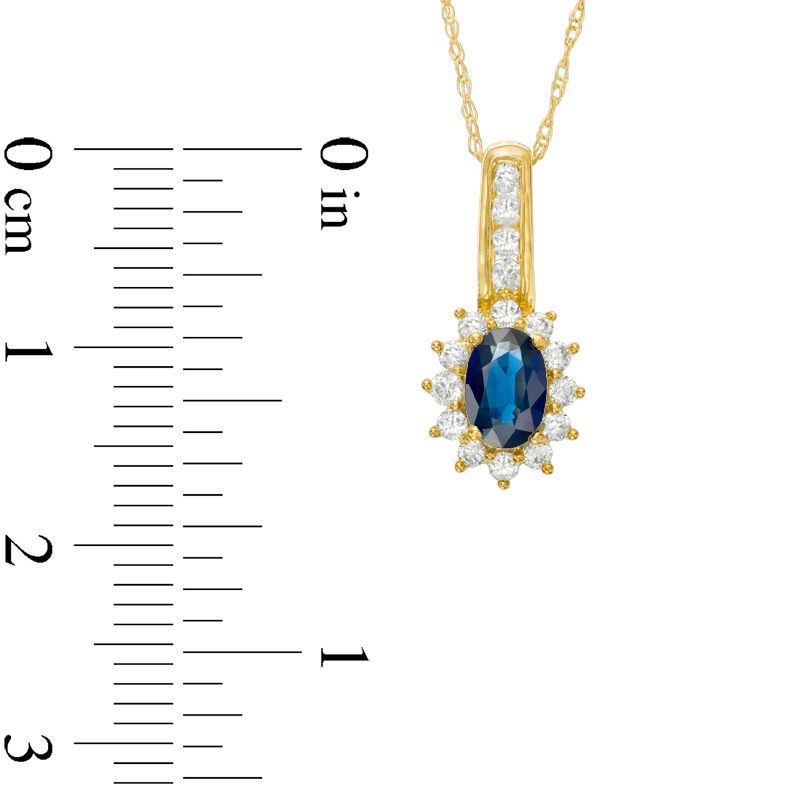 Main Image 2 of Oval Blue Sapphire and 0.25 CT. T.W. Diamond Starburst Frame Drop Pendant in 10K Gold