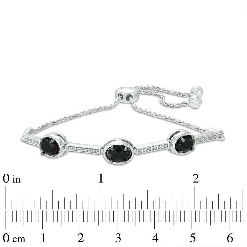 Main Image 2 of Oval Onyx and 0.09 CT. T.W. Diamond Three Stone Bar Bolo Bracelet in Sterling Silver - 9.5"