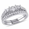 Thumbnail Image 1 of 0.73 CT. T.W. Diamond Three Stone Bridal Set in 10K White Gold