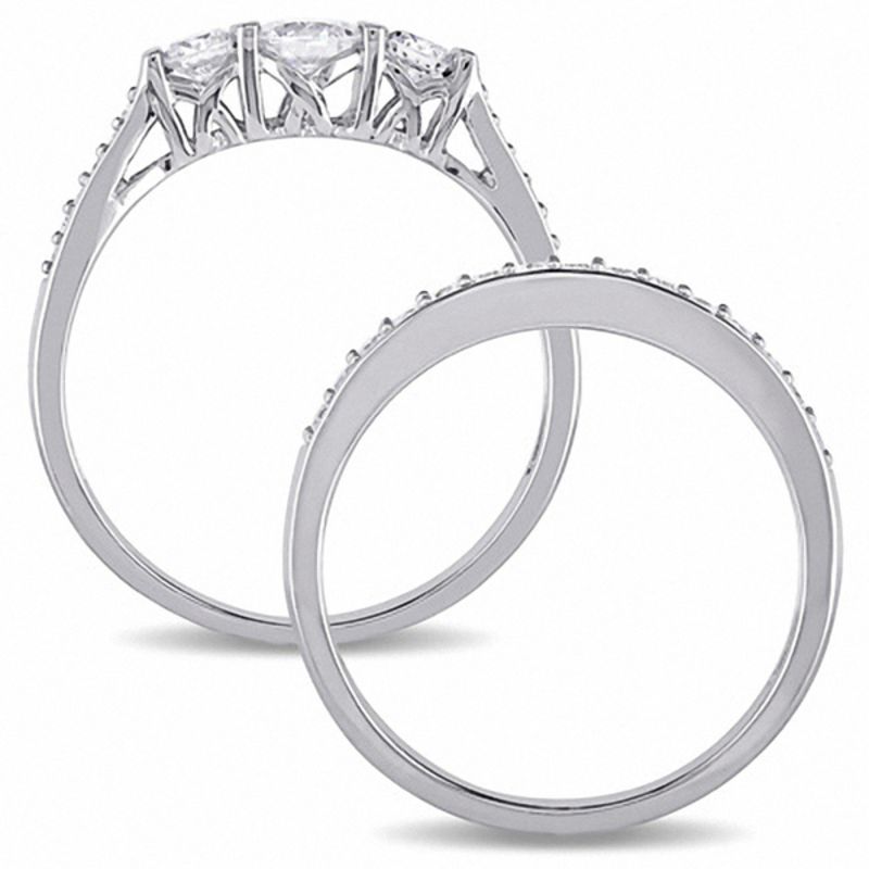 0.73 CT. T.W. Diamond Three Stone Bridal Set in 10K White Gold