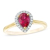 Thumbnail Image 0 of Pear-Shaped Lab-Created Ruby and White Sapphire Frame Ring in 10K Gold