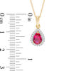 Thumbnail Image 1 of Pear-Shaped Lab-Created Ruby and White Sapphire Frame Pendant in 10K Gold