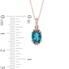 Oval London Blue Topaz and Diamond Accent Pendant in 10K Rose Gold