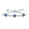 Thumbnail Image 0 of 5.0mm Lab-Created Blue and White Sapphire Frame Three Stone Bolo Bracelet in Sterling Silver - 9.0"