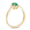 Thumbnail Image 1 of Oval Emerald and 0.11 CT. T.W. Diamond Frame Ring in 10K Gold