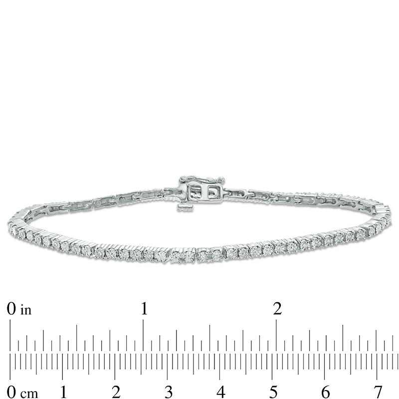 0.10 CT. T.W. Diamond Tennis Bracelet in Sterling Silver - 7.5"