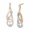 Thumbnail Image 0 of 0.30 CT. T.W. Diamond Crossover Drop Earrings in 10K Tri-Tone Gold