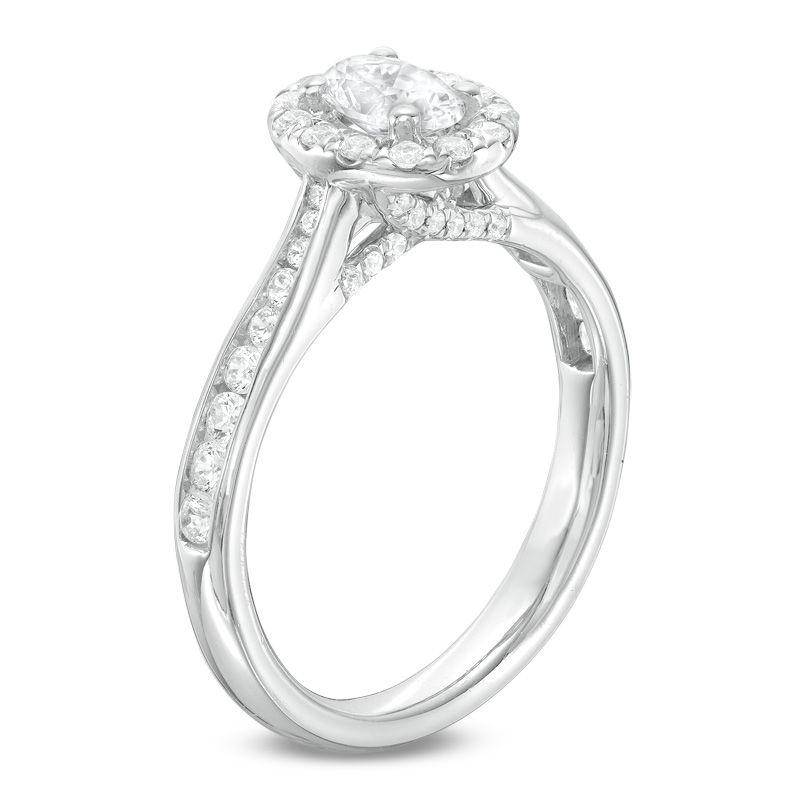 1.00 CT. T.W. Canadian Certified Oval Diamond Frame Engagement Ring in 14K White Gold (I/SI2)